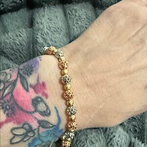 Elegant Gold and Silver Beaded Bracelet